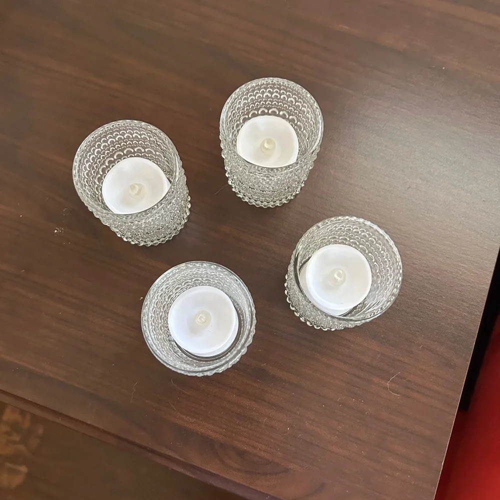 Set of 18 glass votive candle holders with tea lights